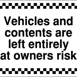 vehicles left at own risk sign