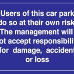 car parking at owners risk sign